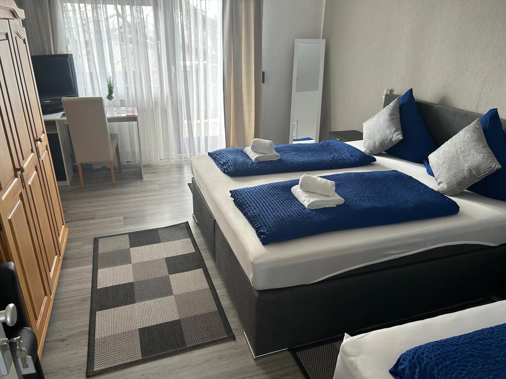 Dreibettzimmer mit Balkon
